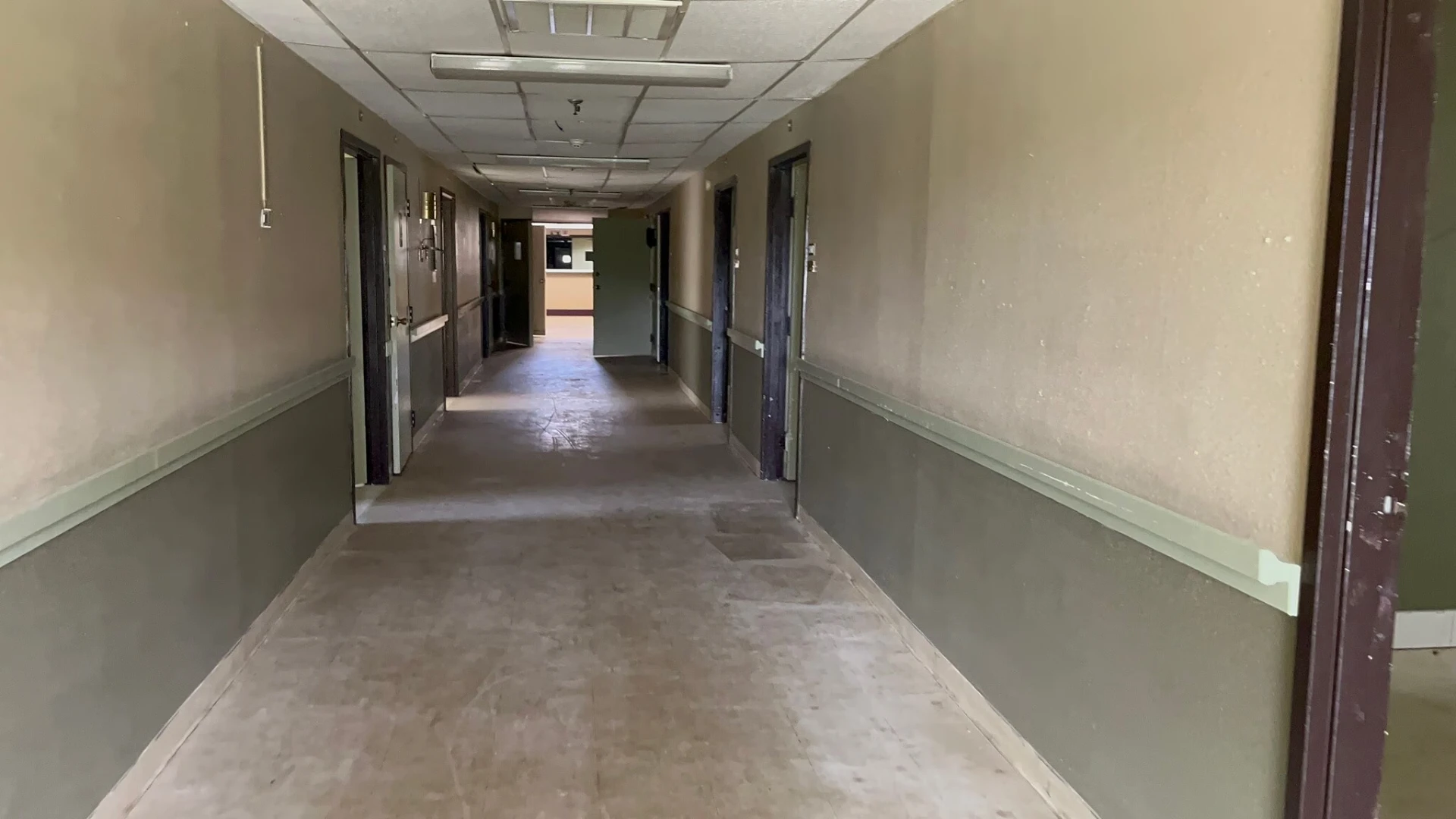 The vacant, neglected hallway before renovation