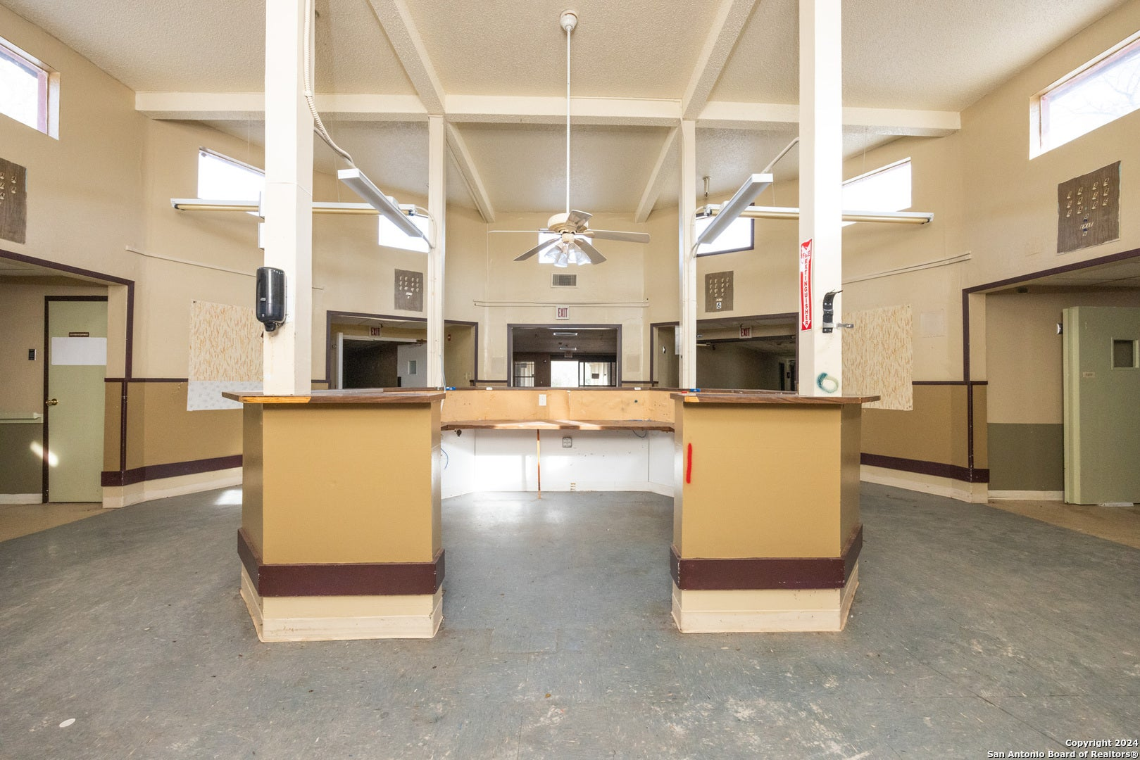 The vacant, worn lobby before renovation